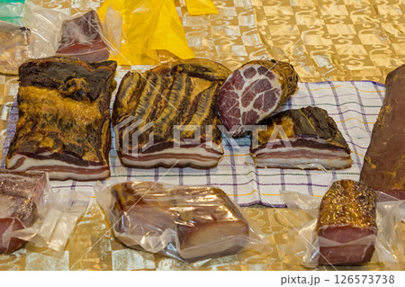 Homemade cured bacon on local market 126573738