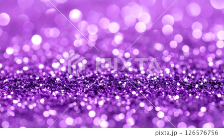 Bright glowing purple and pink Christmas bokeh circles sparkle on an abstract, festive holiday background Bright glowing purple and pink Christmas bokeh circles sparkle on an abstract, festive holiday background 126576756