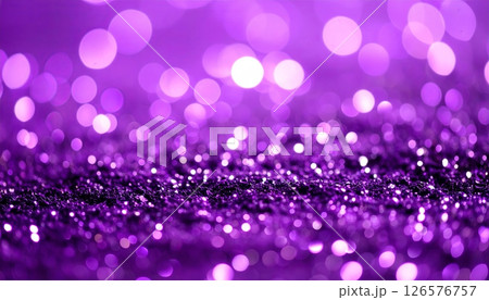 Bright glowing purple and pink Christmas bokeh circles sparkle on an abstract, festive holiday background 126576757