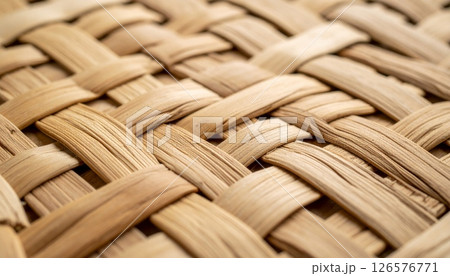 Natural bamboo and wicker weave texture creates a seamless brown pattern for floor or wall material 126576771