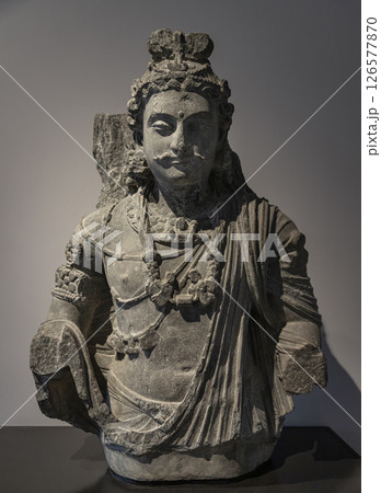 Bust of a Bodhisattva Maitreya Sculpture (Sanskrit) or Metteyya (Pali) displayed in Victoria and Albert Museum. 126577870