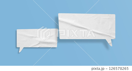 White speech bubble crumpled paper isolated on light blue background White speech bubble crumpled paper isolated on light blue background 126578265