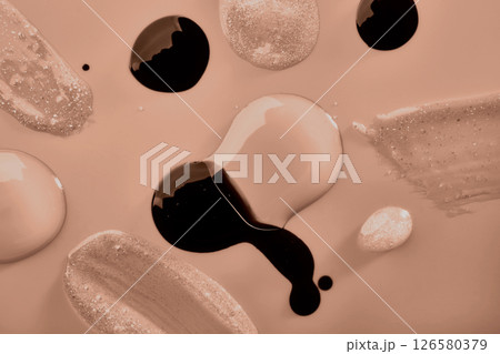 Lip gloss transparent drops and samples in mocha mousse color Lip gloss transparent drops and samples in mocha mousse color 126580379