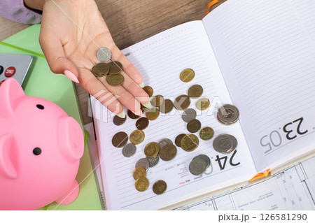 Effective budgeting using coins and various savings tools for enhanced financial management Effective budgeting using coins and various savings tools for enhanced financial management 126581290