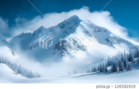 Majestic snow-covered mountain peak shrouded in ethereal clouds, 126582919