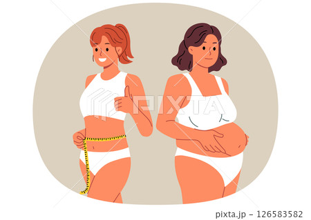 Slender woman fitness trainer stands near client suffering from obesity and shows thumbs up Slender woman fitness trainer stands near client suffering from obesity and shows thumbs up 126583582
