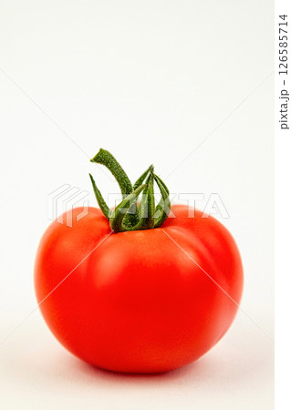 A large red tomato. Tomato on a white background. Isolated Tomato A large red tomato. Tomato on a white background. Isolated Tomato 126585714