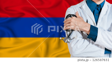 Doctor with stethoscope on Armenia flag. Doctor holding stethoscope on Armenia flag 126587631