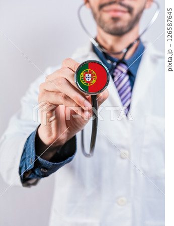 Portugal health and medical insurance concept. Portugal healthcare system, doctor holding stethoscope 126587645