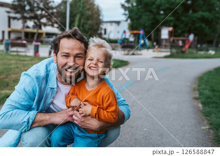 Portrait of dad and child enjoying time together 126588847