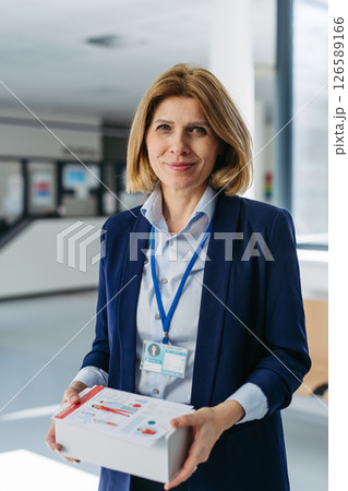 Portrait of female medical sales representative. Portrait of female medical sales representative. 126589166