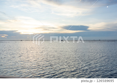 View of sea Gulf of Thailand at chonburi on twilight time, focus selective View of sea Gulf of Thailand at chonburi on twilight time, focus selective 126589695