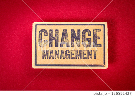 Change Management. Text on Vintage Cardboard Label. Red Background Change Management. Text on Vintage Cardboard Label. Red Background 126591427