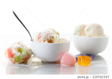 Milk yogurt and jelly ice cream in a white bowl. 126592587