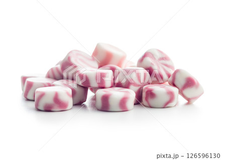 Colorful striped candies isolated on white background. 126596130