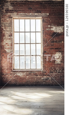 Collection of empty, rustic room interiors featuring weathered brick walls and atmospheric light. 126596580