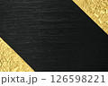 黒塗りの板と金色の和紙の背景素材 126598221