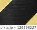 黒塗りの板と金色の和紙の背景素材 126598227