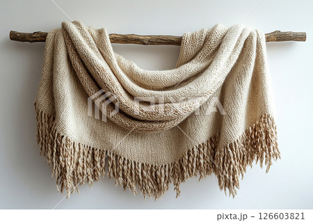 Fabric wall hanging on a white background. Boho-chic style. Fabric wall hanging on a white background. Boho-chic style. 126603821