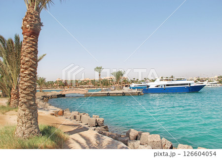 Ships and yachts moored in bay of Hurghada. Seafront resort with moorage 126604054