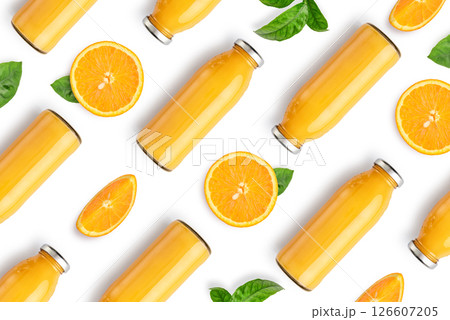 Pattern from bottles of orange juice and orange slices Pattern from bottles of orange juice and orange slices 126607205
