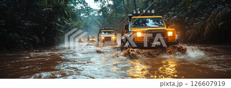 Jungle trek scene with convoy of trucks navigating dense mud, rough water, and wild roots in a thrilling off-grid off-road challenge, banner 126607919