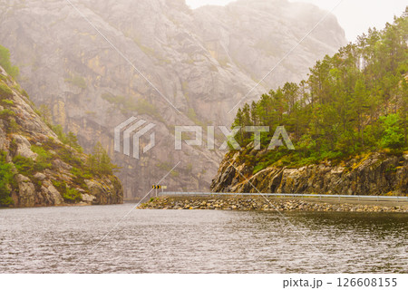 Road and fjord landscape in Norway 126608155