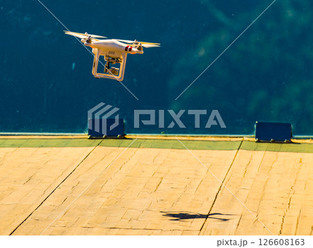 Drone flying against norwegian nature Drone flying against norwegian nature 126608163