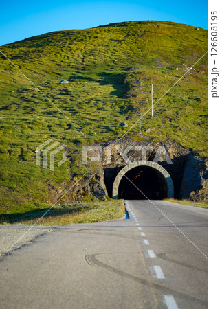 Road with tunnel in mountains Norway 126608195