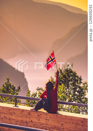 Tourist enjoy fjord view on Stegastein viewpoint Norway Tourist enjoy fjord view on Stegastein viewpoint Norway 126608292