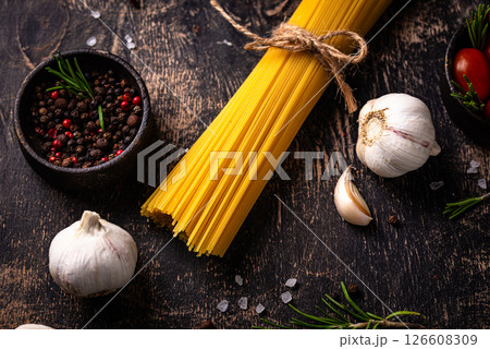 Italian food background with spaghetti, tomato and spices 126608309