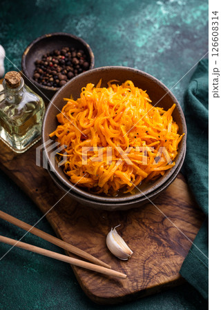 Spicy korean carrot salad in bowl 126608314