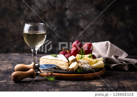Different types of cheese, wine and grapes Different types of cheese, wine and grapes 126608328