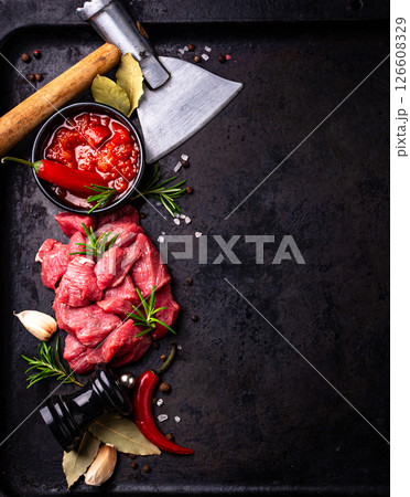 Raw beef meat and ingredients for cooking 126608329