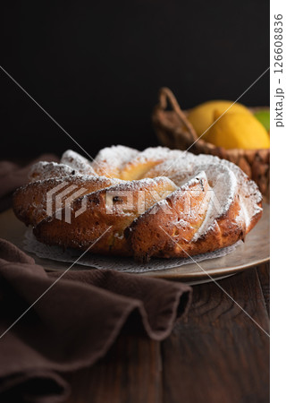 Lemon bundt cake powdered sugar on wooden table Lemon bundt cake powdered sugar on wooden table 126608836