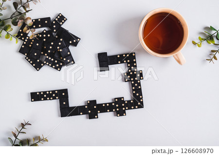 A calm domino board game for leisure on the table top view A calm domino board game for leisure on the table top view 126608970