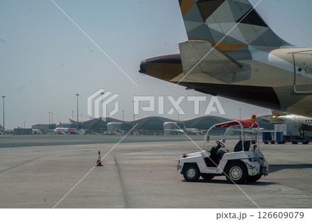 Sunny Abu Dhabi - view on airport of Abu Dhabi Sunny Abu Dhabi - view on airport of Abu Dhabi 126609079