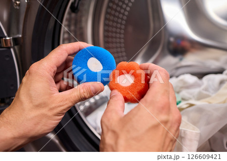 Using Laundry Pods in the Dryer Offers Convenient and Efficient Cleaning Solutions for Your Clothes 126609421