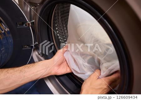 Washing Shoes in a Laundry Bag is an innovative method for efficiently cleaning your footwear Washing Shoes in a Laundry Bag is an innovative method for efficiently cleaning your footwear 126609434