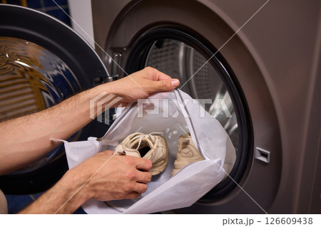 Washing Shoes in a Laundry Bag is an innovative method for efficiently cleaning your footwear 126609438