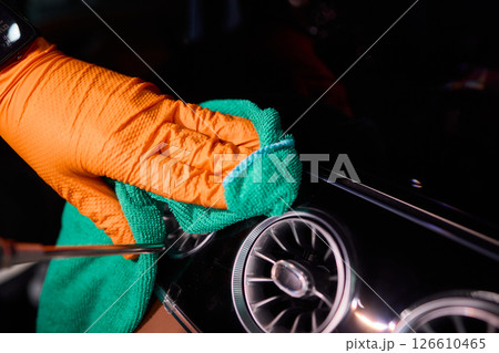 Properly Cleaning Your Car Interior Using Microfiber Cloths and Protective Gloves is Important Properly Cleaning Your Car Interior Using Microfiber Cloths and Protective Gloves is Important 126610465