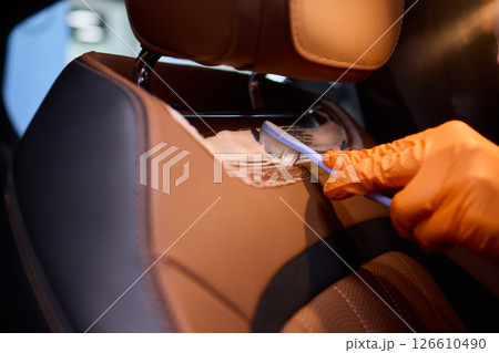 Demonstration of an Expert Car Interior Cleaning Process in Action with Every Detail Considered Demonstration of an Expert Car Interior Cleaning Process in Action with Every Detail Considered 126610490
