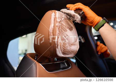 Demonstration of an Expert Car Interior Cleaning Process in Action with Every Detail Considered 126610500