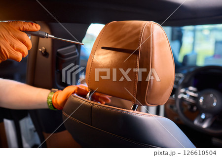 Demonstration of an Expert Car Interior Cleaning Process in Action with Every Detail Considered 126610504