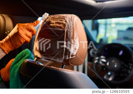 Demonstration of an Expert Car Interior Cleaning Process in Action with Every Detail Considered 126610505