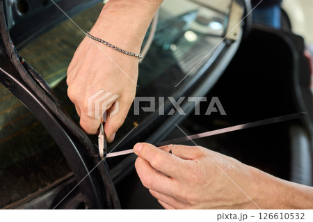 Our experts offer quality automotive glass installation services, ensuring safety for every vehicle 126610532