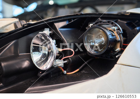 A Detailed Close Up View of an Automotive Headlight Assembly Displaying Quality and Craftsmanship A Detailed Close Up View of an Automotive Headlight Assembly Displaying Quality and Craftsmanship 126610553