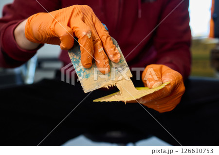 The Auto Body Repair Process includes proper Putty Application techniques and effective methods The Auto Body Repair Process includes proper Putty Application techniques and effective methods 126610753