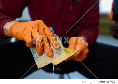 The Auto Body Repair Process includes proper Putty Application techniques and effective methods 126610755