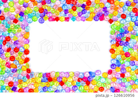Background of colored beads on a white background 126610956